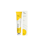 Front view of a 20ml tube of The Glow, next to its box